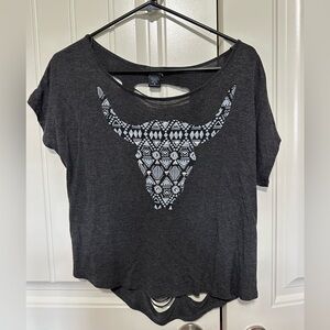 Women’s shirt with cut out back. Size medium.